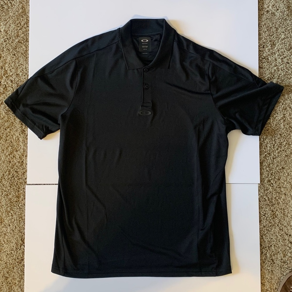 Black Oakley golf shirt/polo. Sz. Medium